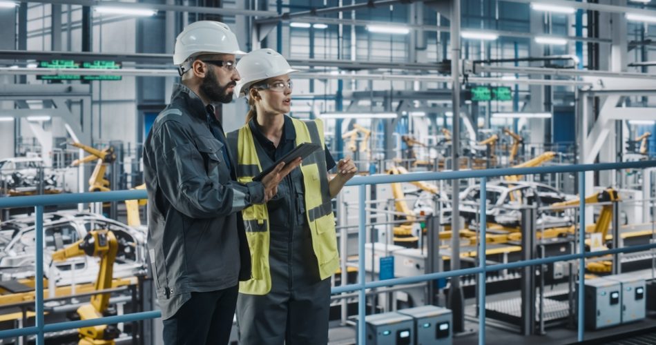Male,Specialist,And,Female,Car,Factory,Engineer,In,High,Visibility
